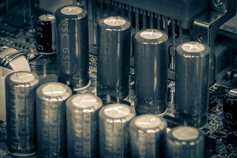 Capacitors, computer, circuit board, and technology