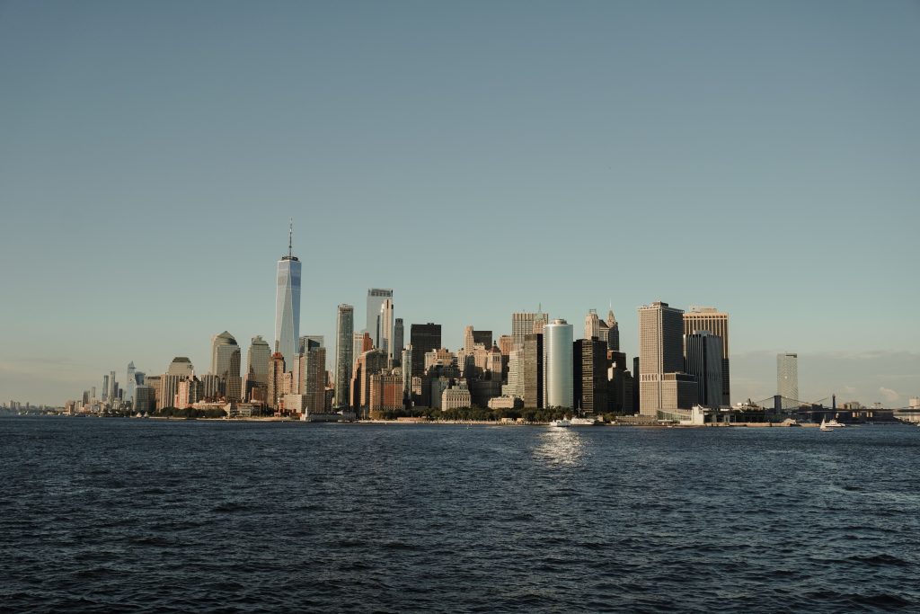 Scenic view of the New York City skyline featuring the iconic One World Trade Center during the day