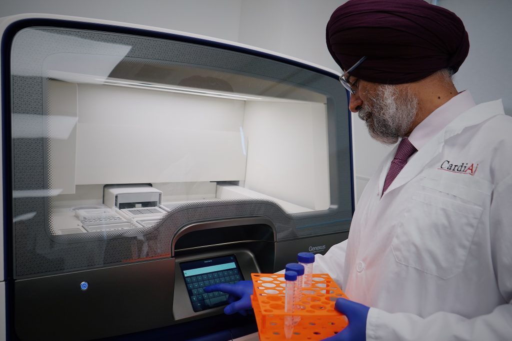 Researcher operating laboratory equipment, an illustrative research photo